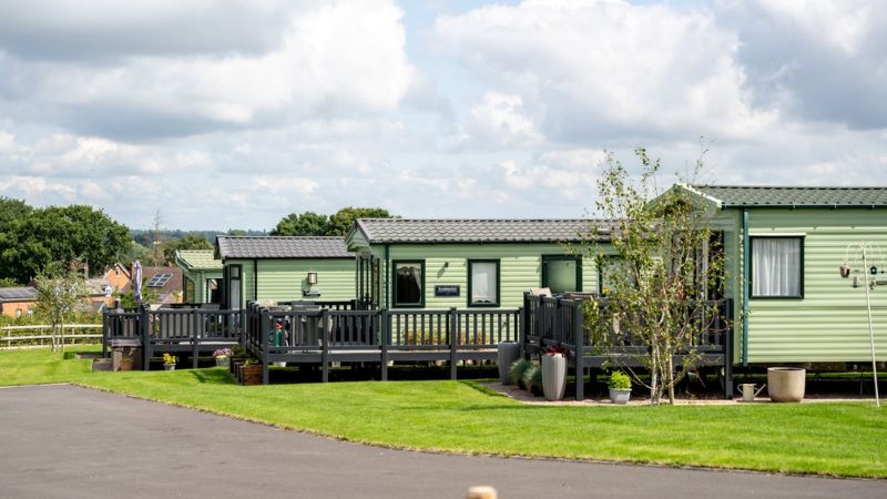 Static caravan holiday homes with composite decking at Green Meadow Holiday Aberystwyth